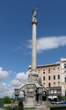 Troy, NY – US – Aug 13, 2023 The Soldiers and Sailors Monument, a 50-foot granite column crowned by The Call to Arms, a 17-foot bronze statue of the Goddess Columbia, on a granite base.