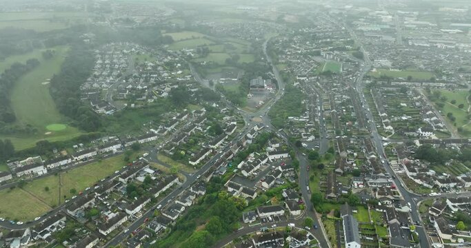Panoramic bird's eye view of the misty town of Wexford, Ireland 4k