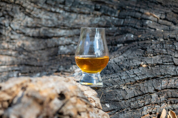 Single malt Scotch whiskey in the Glencairn glass in selective focus.