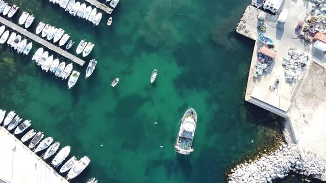 Cinematic overhead 4K drone clip of boats and yachts inside a marina in the port de Carro in Martigues commune, France