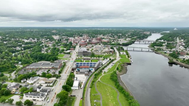 Aerial view of Bangor, Maine with the Penobscot River flowing alongside the city.