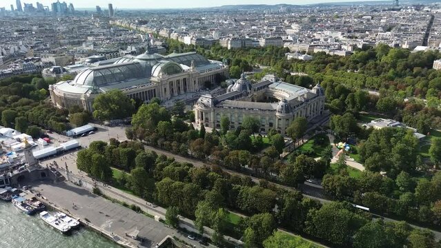 Aerial drone view of Petit Palais and Grand Palais in Paris with financial district in background, France