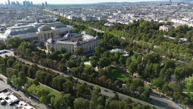 Petit Palais and Grand Palais in Paris with financial district in background, France. Aerial drone view