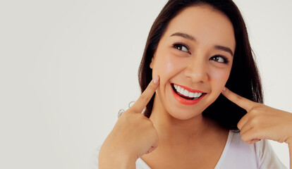 Portrait asian woman showing off her beautiful teeth : Young woman's face with healthy teeth white...