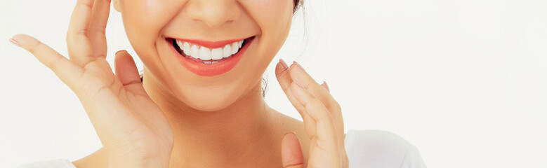 Asian woman with beautiful teeth : Closeup young woman's face with healthy teeth white clean beautiful smile : Happy woman taking care of her teeth perfectly : Oral care dentistry concept.