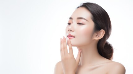 Portrait of beauty asian woman with fair perfect healthy lift glowing skin hand touching chin isolated on white background. - obrazy, fototapety, plakaty