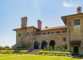 Sunny exterior view of the E. W. Marland Mansion