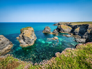 Minnows Islands from the SW Coast Path, north of Porthcothan, Cornwall, on a clear sunny day in...