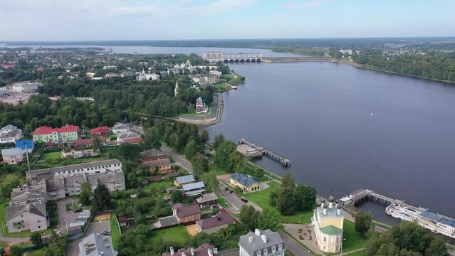 Picturesque aerial view of modern townscape of Uglich overlooking dam on Volga River on summer day, Yaroslavl region, Russia. High quality 4k footage