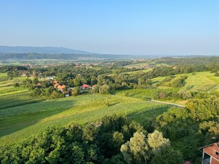 Naklejka premium View of forests, fields, villages and Zagorje hills, during a panoramic balloon flight over Croatian Zagorje - Croatia (Panoramski let balonom iznad Hrvatskog zagorja - Hrvatska)