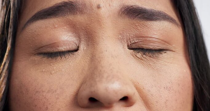 Eyes, confused and woman face with anxiety in studio for mental health problem, mind or emotion conflict. Doubt, fear and lady model stress, worry or depression, crisis and paranoid, bipolar or risk