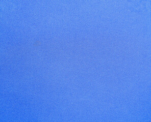 Close-up texture of natural  Blue fabric or cloth in light  Blue color. Fabric texture of natural cotton or linen textile material. Blue canvas background