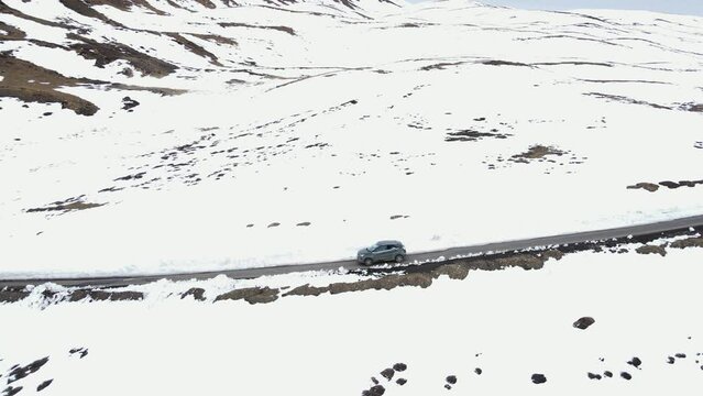 aerial snow landscape in Spiti district of Himachal Pradesh  car driving in Himalayan mountains india tourist travelling 