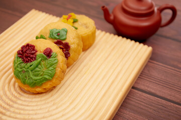 Conceptual mid-autumn festival food and drink still life.

