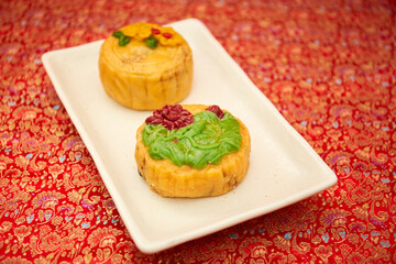 Flat lay mid autumn festival mooncake and tea still life on table 