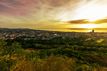 high angle nature background On the mountain overlooking the surrounding natural scenery, overlooking the sea, trees, rocks, trees, adventure tourism.