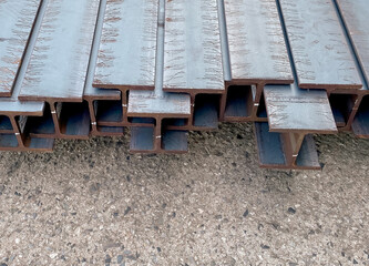 Metal profile beam in packs at the warehouse of metal products.Metal profile beam in packs at the warehouse of metal products.Thailand