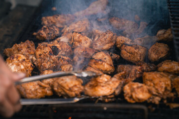 flavorful grilling close-up of chicken on charcoal bbq stove