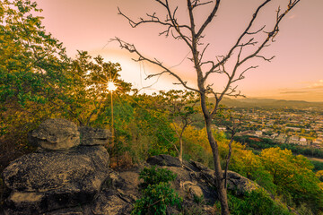 high angle nature background On the mountain overlooking the surrounding natural scenery, overlooking the sea, trees, rocks, trees, adventure tourism.
