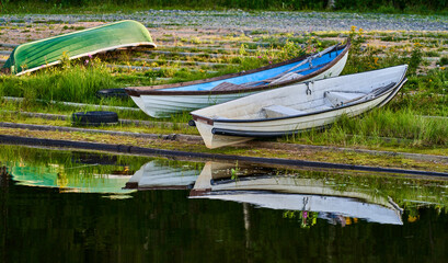 Row boats in river bank