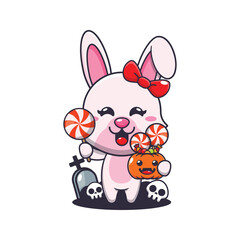 Cute bunny holding candy in halloween day. 