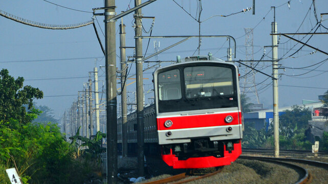 The train is running on the rails towards the destination