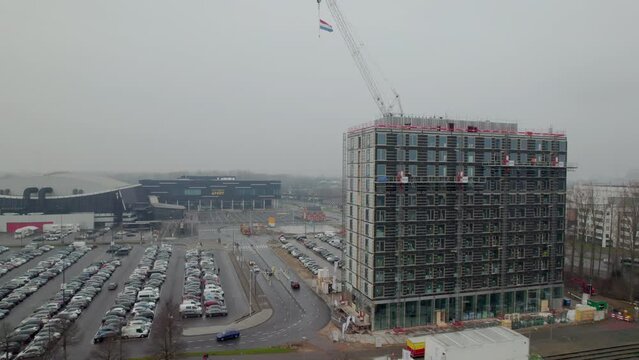 Hotel Building Under Construction In Rotterdam Near Rotterdam Ahoy In The Netherlands. wide aerial