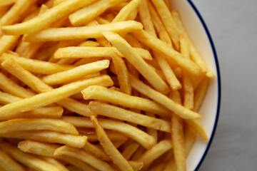 Homemade French Fries on a Plate, top view. Flat lay, overhead, from above. Close-up.