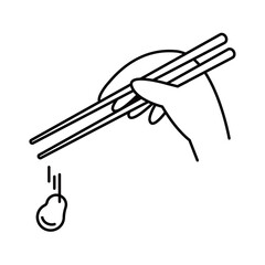 A scene where beans spill from chopsticks.