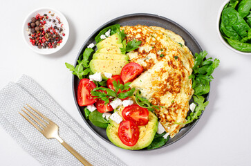 Omelette Served with Avocado and Cherry Tomatoes, Healthy Breakfast