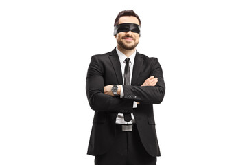 Obraz na płótnie Canvas Businessman in a black suit wearing a blindfold