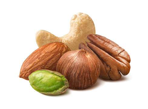 Pistachio, cashew, hazelnut, pecan and almond nuts isolated on white background