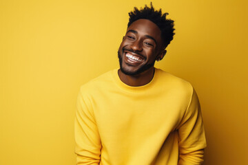 Fototapeta premium Man Laughing Black Man Studio Background Yellow Joy Fun Happiness