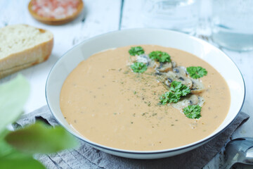 A bowl with mushroom cream soup