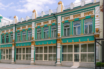 The building of the art museum in the city of Vladikavkaz. An old mansion of the early 20th century in the art nouveau style with eclectic elements. Gilded stucco on the old building.