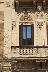 An old window in an old building in Catania, Italy
