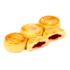 Cottage cheese pancakes with cherries on a white background