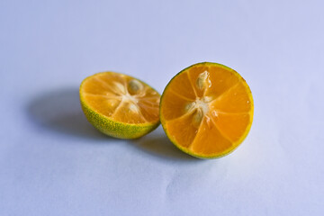Calamansi oranges on a white background
