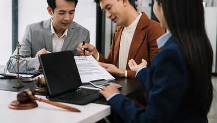 Team lawyer businessmen working with paperwork on his desk in office workplace for consultant lawyer in office.