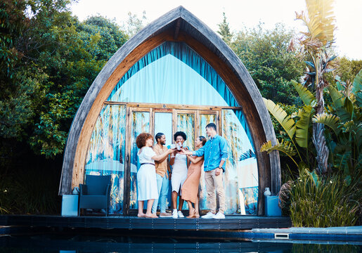 Garden lodge, glamping and friends cheers at a cabin with luxury accommodation and forest cottage. Travel, holiday and people relax at destination in Bali for vacation and freedom at resort pool