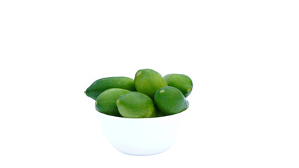 Green Pointed gourd or parwal in a bowl isolated on white background.