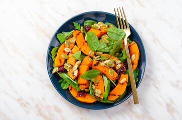Grilled Pumpkin Salad with Arugula, Spinach, and Pumpkin Seeds, Salad Mix with Roasted Pumpkin, Autumn Salad