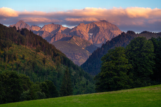 Peaks of the High Tatras photographed from a mountain glade at sunset