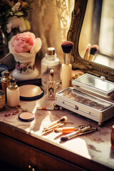 Obraz na płótnie Canvas An arrangement with many cosmetic makeup tools close together