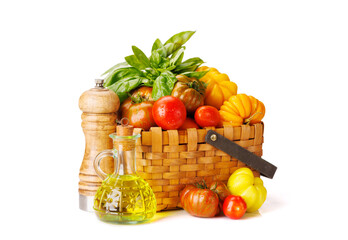 Assorted tomatoes in rustic basket