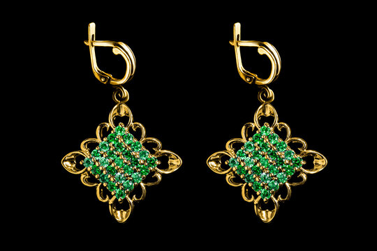 Emerald earrings on black