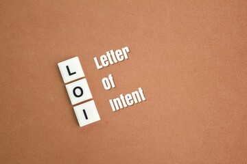 letters of the LOI alphabet or the word letter of intent. the concept of agreement or deal.