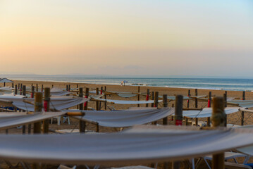 Sunbeds, Beach loungers, Relaxation, Beachside, Umbrellas,