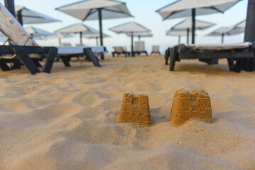 Sunbeds, Beach loungers, Relaxation, Beachside, Umbrellas,