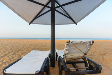 Sunbeds, Beach loungers, Relaxation, Beachside, Umbrellas,